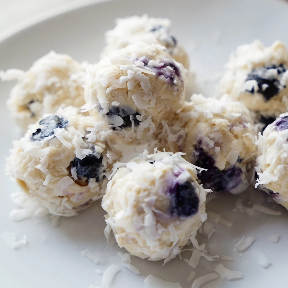 Serving Lemon Blueberry Cottage Cheese Protein Bites as a healthy snack.