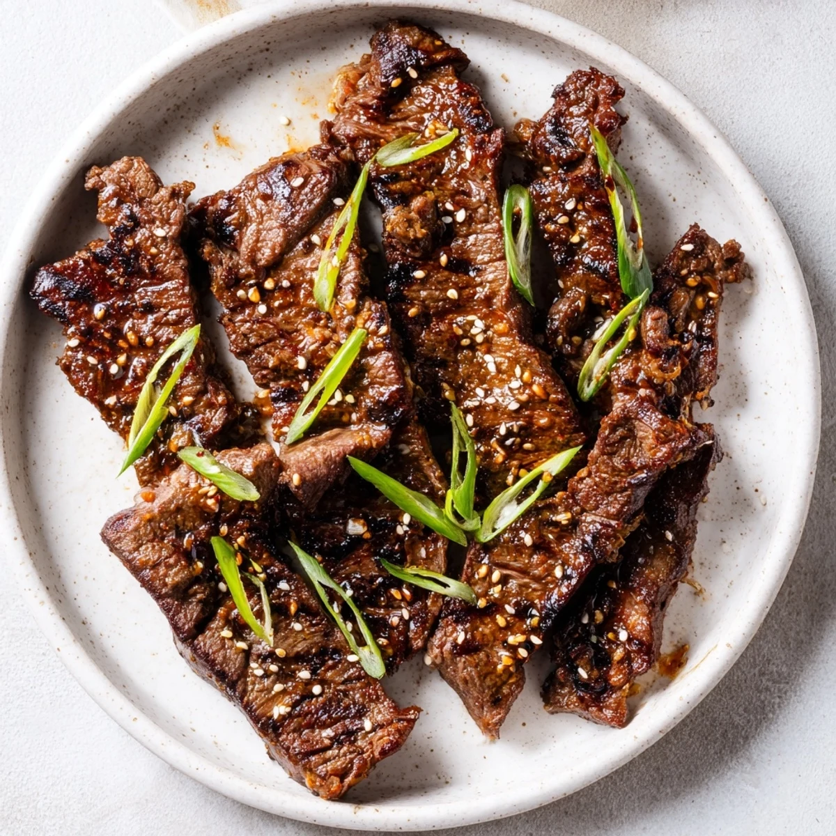 Tender beef short ribs marinated in sweet Korean galbi sauce grilled to smoky perfection