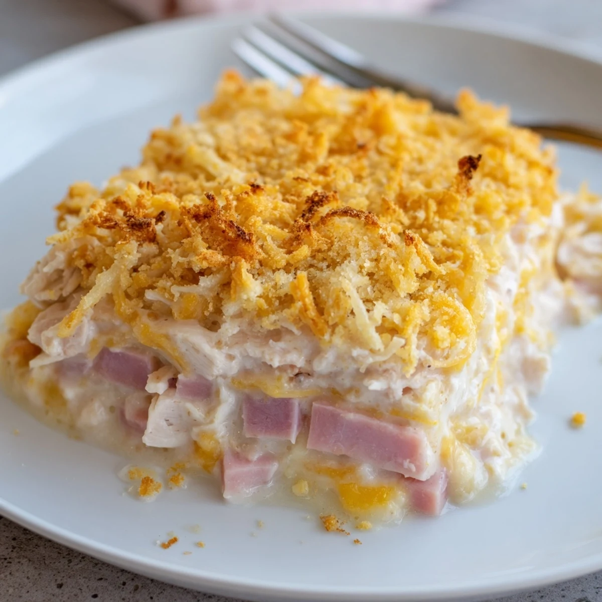 Golden-bubbly Chicken Cordon Bleu Casserole topped with crispy Parmesan-Panko crumbs